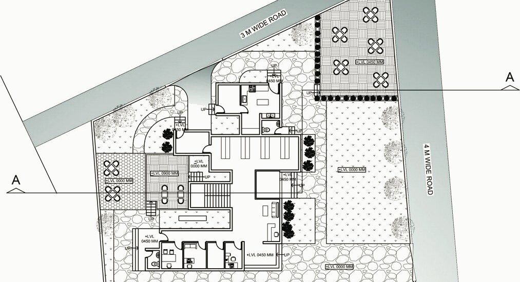 Site plan on a triangular plot between roads.