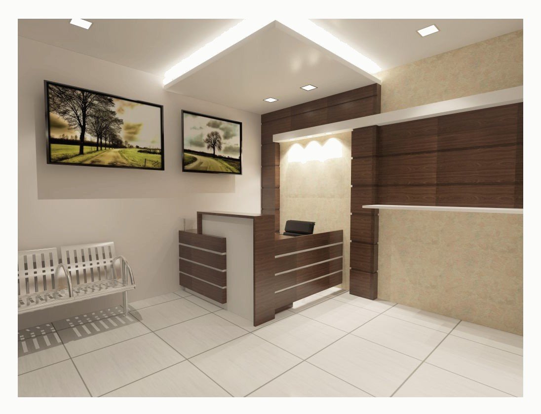 Room with framed artwork above a low unit.