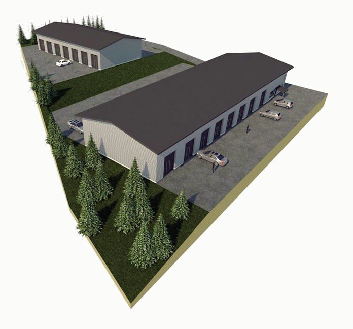 Aerial render of a long storage building with a dark roof beside spruce trees.