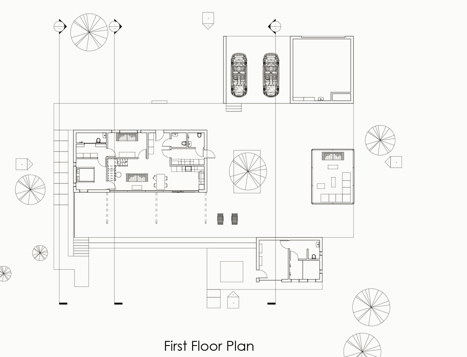 First floor plan with the garage, living spaces, courtyard and sauna, surrounded by trees.